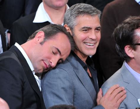 Sizing Up The Competition George Clooney Larks Around With His Fellow