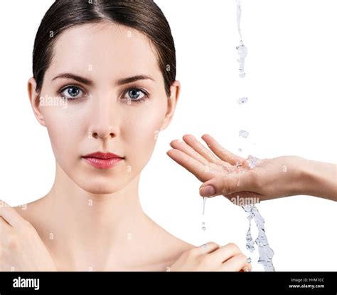 Woman Face And Pouring Water In Hand Stock Photo Alamy