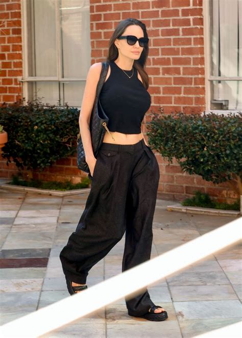 Angelina Jolie Goes Casual In Breezy Wide Leg Trousers And A Cropped