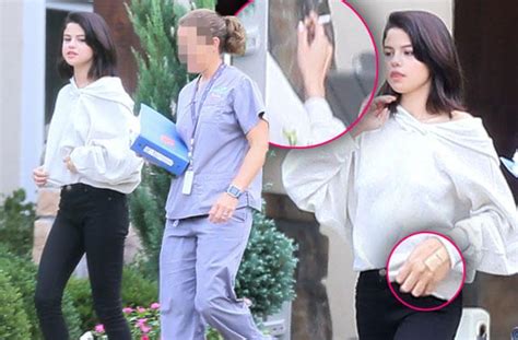 bandaged selena gomez caught smoking outside rehab facility — is she ok