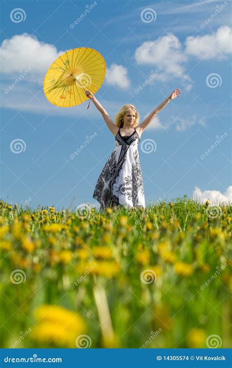 Girl With Raised Parasol In Spring Stock Photo Image Of Cloudy