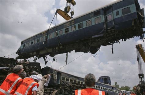 bodies pulled from the wreckage of india train accident the latest photos of the rail disaster