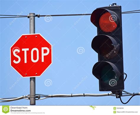 Stop Sign And Red Traffic Light Stock Photo Image Of Traffic Warning