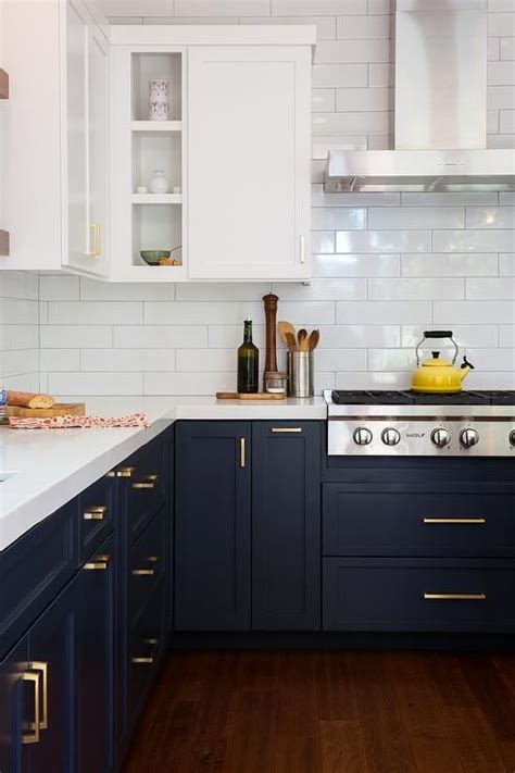 Kitchen cabinets dark bottom white top. Have you considered using blue for your kitchen cabinetry ...