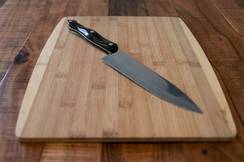 Free Stock Photo Of Chefs Knife On Wood Cutting Board