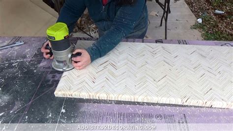 First, wrap a strip of crepe masking tape around the panel and place the next, take the long offcut, place it good side up, and make three rip cuts on the table saw to produce the apron stock. DIY Edge Grain Plywood Herringbone Coffee Table - Addicted 2 Decorating®