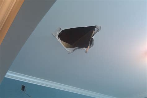 When a large section of the drywall on your ceiling is saggy, warped, droopy, broken, moldy, or wet, you need more than just a spot repair. The Birmingham Handyman - hole in drywall ceiling