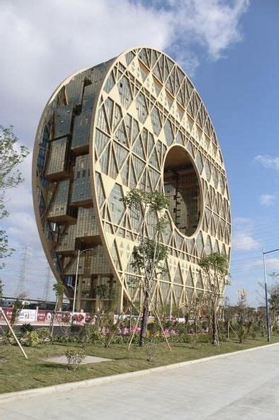 Chinas Wild Circular Skyscraper Opens In Guangzhou Slideshow