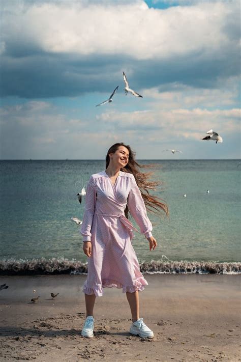Beautiful Unusual Woman Walking On The Beach Stock Photo Image Of