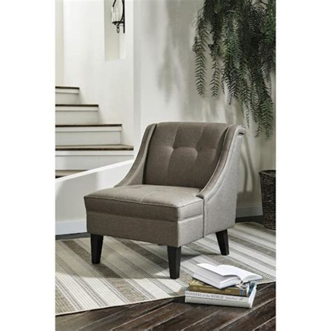 Farmhouse chairs celebrate the rustic charm of farmhouse living by emphasizing wood craftsmanship, distressed finishes and fresh, light neutrals. 9120260 Ashley Furniture Calicho Living Room Accent Chair