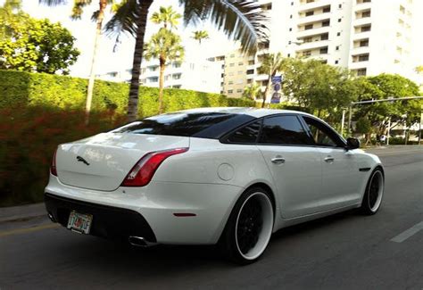 White Jaguar Xj With Custom Black White Rims Jaguar Luxury Motor