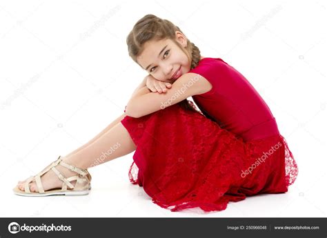 Little Girl Hugging Her Knees Stock Photo By ©lotosfoto1 250966048