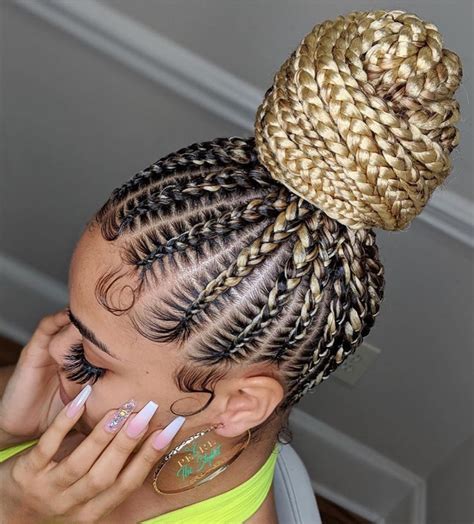 this bun is so pretty 😍 stunning work by pearlthestylist 👌🏾 drop a 🔥 if … in 2020 braided