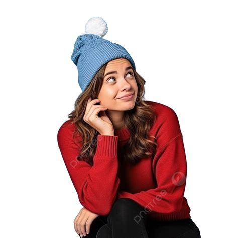 فتاة ترتدي قبعة عيد الميلاد فوق اللون الأزرق المعزول وتفكر في فكرة متأمل سؤال المرأة يعتقد