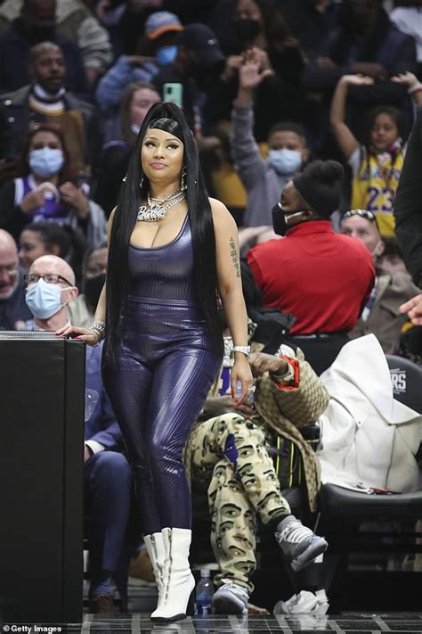 Nicki Minaj Struts Her Stuff Courtside In Purple Skin Tight Jumpsuit At Lakers And Clippers Game