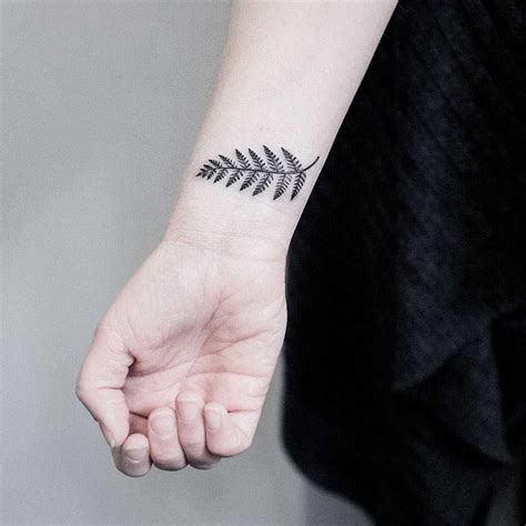 Small Fern Leaf Tattoo On The Wrist