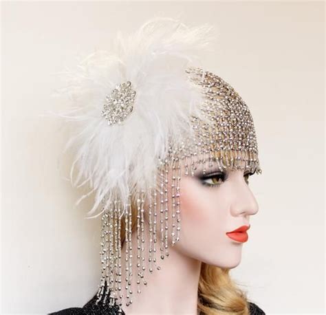 Stunning Stretch Beaded Cap Accentuated With A Fluffy Feather Fascinator That Is Adorned With A