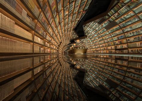 Tunnel Of Books Shelves Wrap Curved Bookstore Walls And Ceiling Urbanist