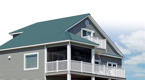 I have a house located along the mississippi gulf coast which needs to be repainted, what's the best brand of exterior latex house paint in a satin or low. GulfSnap™ Standing Seam Metal Roof | Metal roof houses, Green roof house, Exterior house colors