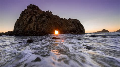 Download Wallpaper 2048x1152 Sea Ocean Rock Light Sunset Ultrawide