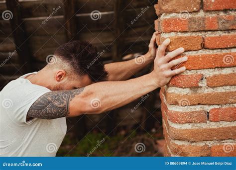 Attractive Guy Next To A Brick Wall Stock Photo Image Of Background