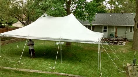 Fantastic for outdoor weddings or small festivals! Backyard party with a 20' x 30' rope and pole tent in Iowa ...