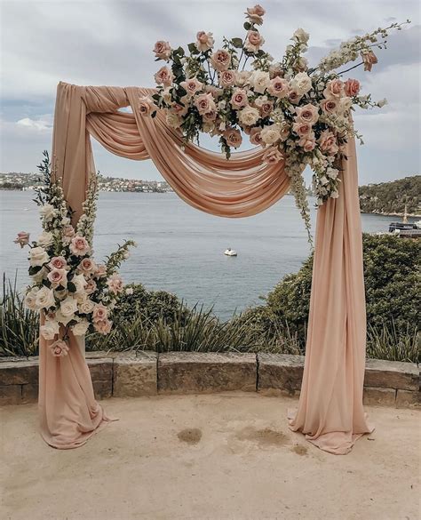 Archway Decor Idea For Ceremony A Pale Peach Fabric Draped With