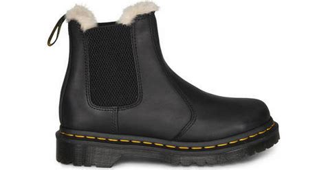 Martens, also commonly known as doc martens, docs or dms is a british footwear and clothing brand, headquartered in wollaston in the wellingborough district of northamptonshire, england. Dr Martens 2976 Leonore Fur Lined - Black • See price