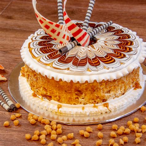 We wish you all a happy+healthy holiday season ahead. Online Butterscotch Cake Delivery in Delhi