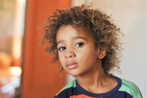 Young Mixed Race Boy With Curly Hair Stock Image Image Of Happiness