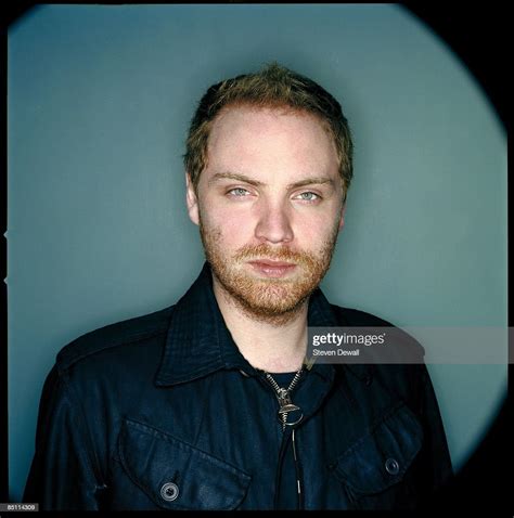 Photo Of Coldplay And Jonny Buckland Posed Studio Portrait Of Jonny