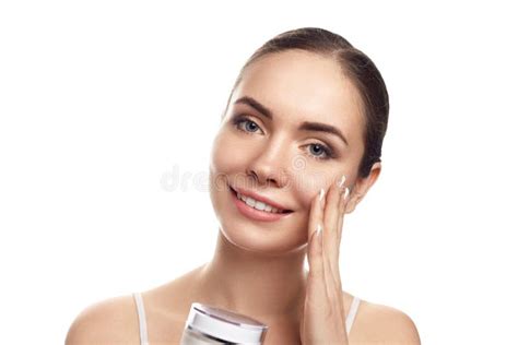Beautiful Young Woman With Clean Fresh Skin Touch Own Face And Holds