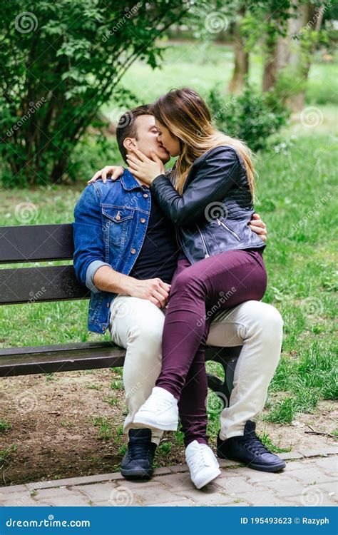 couple kissing on a bench stock image image of tender 195493623