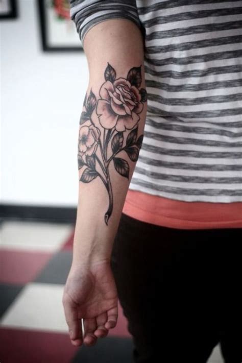 Rose elbow tattoos can look like a real piece of art. Rose Tattoos