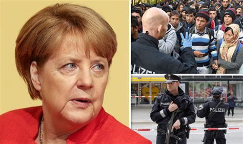 Merkel Warned To Crack Down On Migrants After Deadly Hamburg Attack