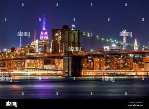 Skyline Of Manhattan And Brooklyn Bridge At Night Hi Res Stock