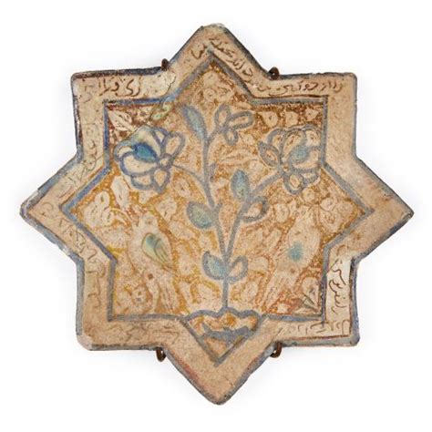 a kashan lustre pottery star tile heavily restored ira…
