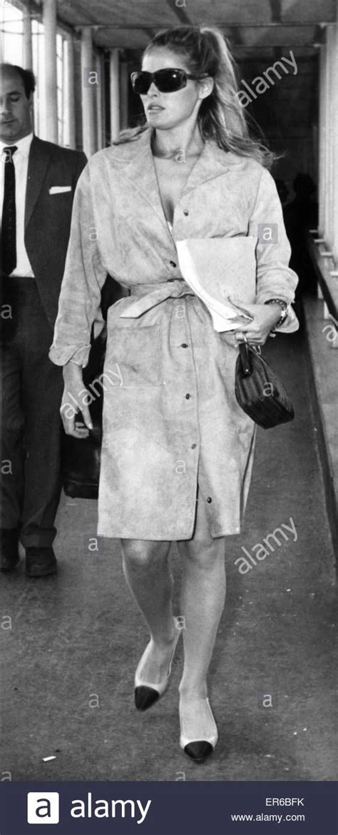 Ursulas Flying Fashion Actress Ursula Andress In Chic Raincoat And