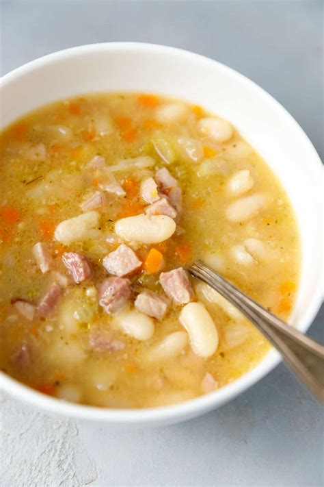 Using a pair of tongs, remove the thyme and ham hocks. White Bean And Ham Soup Recipe - Cooking LSL