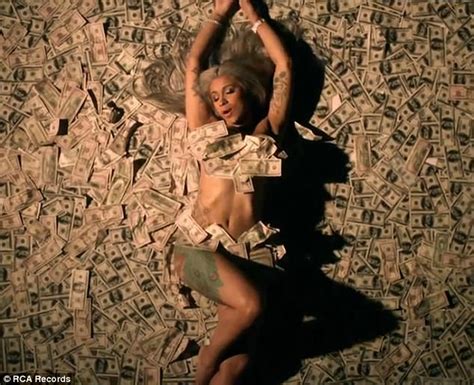 Cardi B Rolls Around Naked On Pile Of Hunred Dollar Bills Express Digest