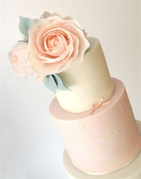 Living Coral Modern Sugar Flowers Topping A Delicate Wedding Cake