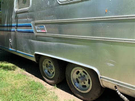 I bought a 5′ by 8′ trailer for my belongings. 1977 Airstream Trade Wind 25FT Travel Trailer For Sale in ...
