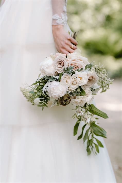 This Subtle And Sophisticated Nude Bridal Bouquet Contains Spring
