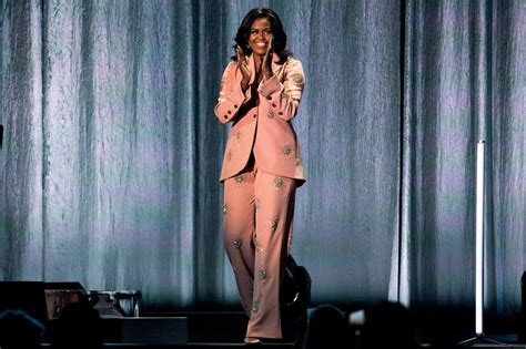 michelle obama sparkles in 18k outfit on becoming book tour