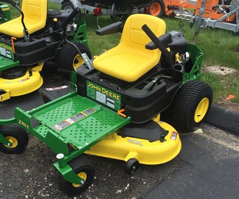 How to remove the deck in a jd gt245. John Deere Z355E Zero-Turn Lawn Mower Review - Haute Life Hub