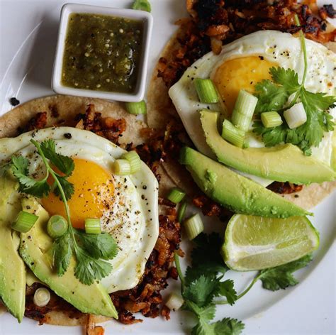 awesome chorizo breakfast tacos with potato hash and fried eggs the 2 spoons