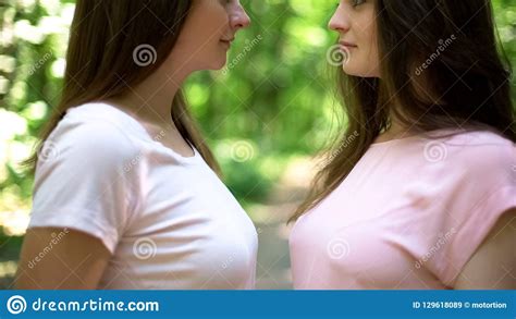 Two Attractive Lesbians Looking Passionately At Each Other Intimate