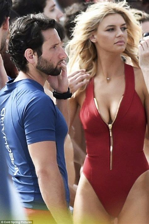 Kelly Rohrbach Showcases Her Pert Derriere In Baywatch Bikini On Set