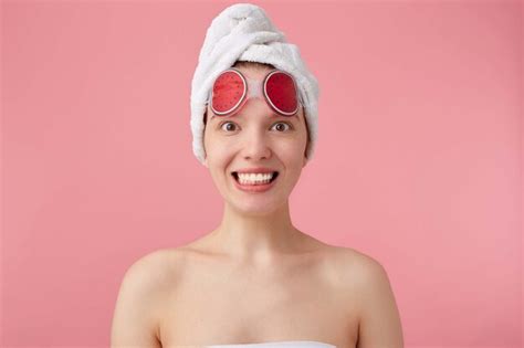 Free Photo Broadly Smiling Young Girl After Spa With A Towel On Her