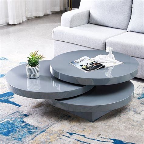 The Triplo Round High Gloss Rotating Coffee Table Is A Sleek And Modern